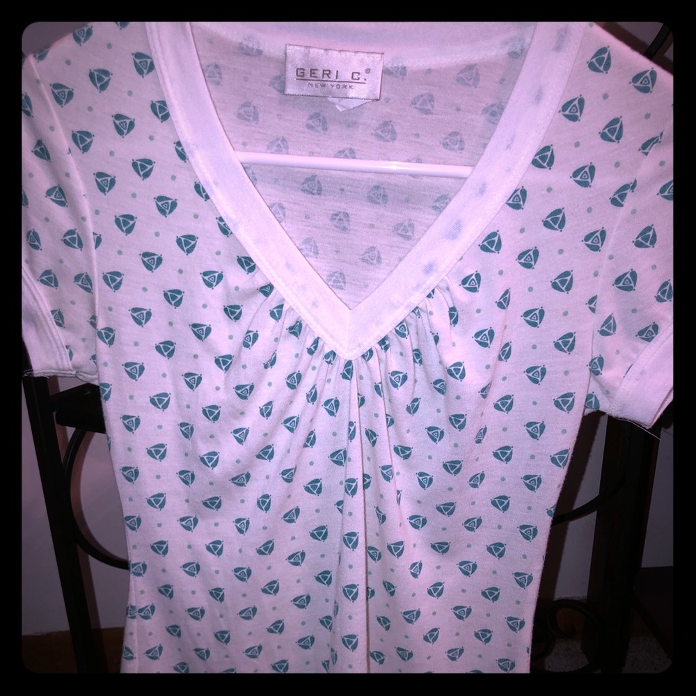 Turquoise Disc V-Neck Ringer Tee!